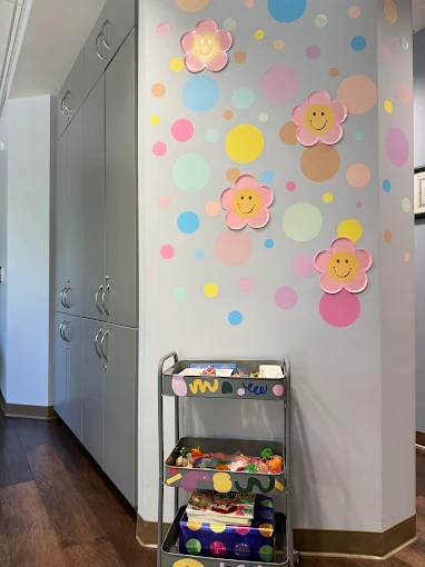 Office Photo of front wall with flowers and polka dots painted on the walls